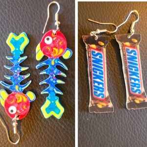 (2)pairs of whimsical earrings.